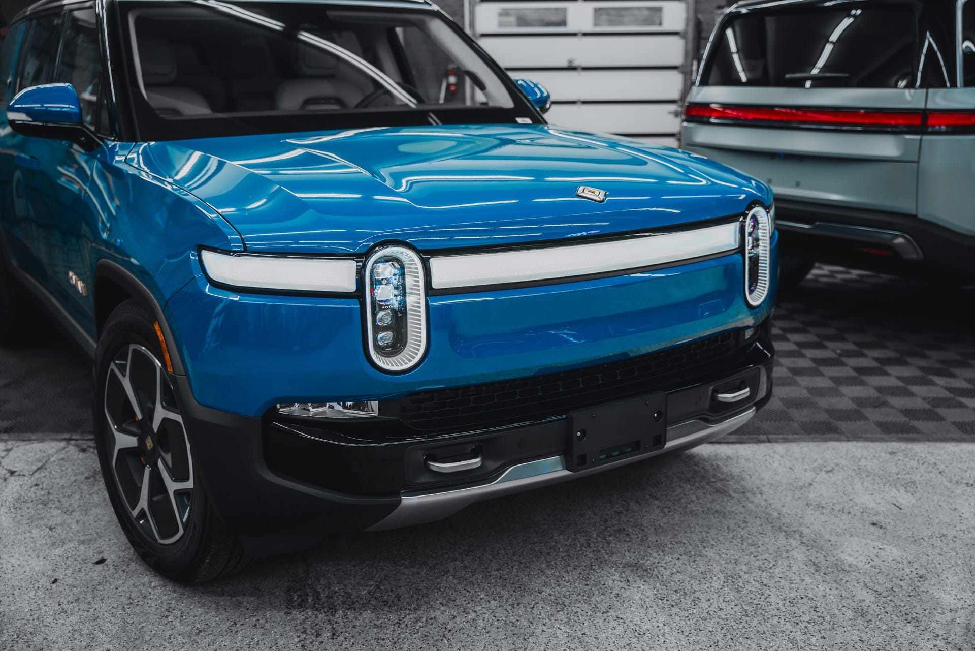 Blue Rivian R1S in the Pristine Detail shop