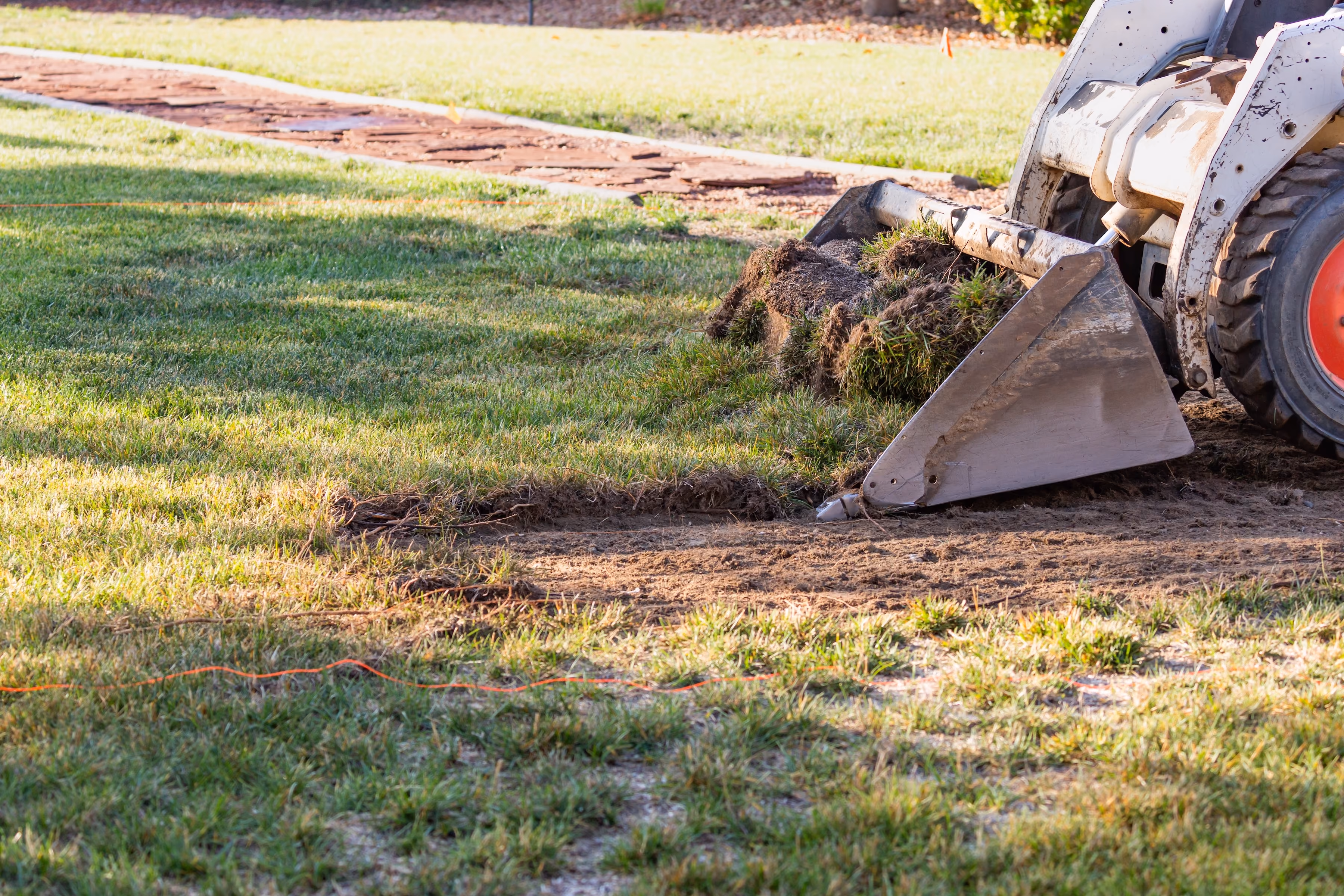 Tractor grass removal