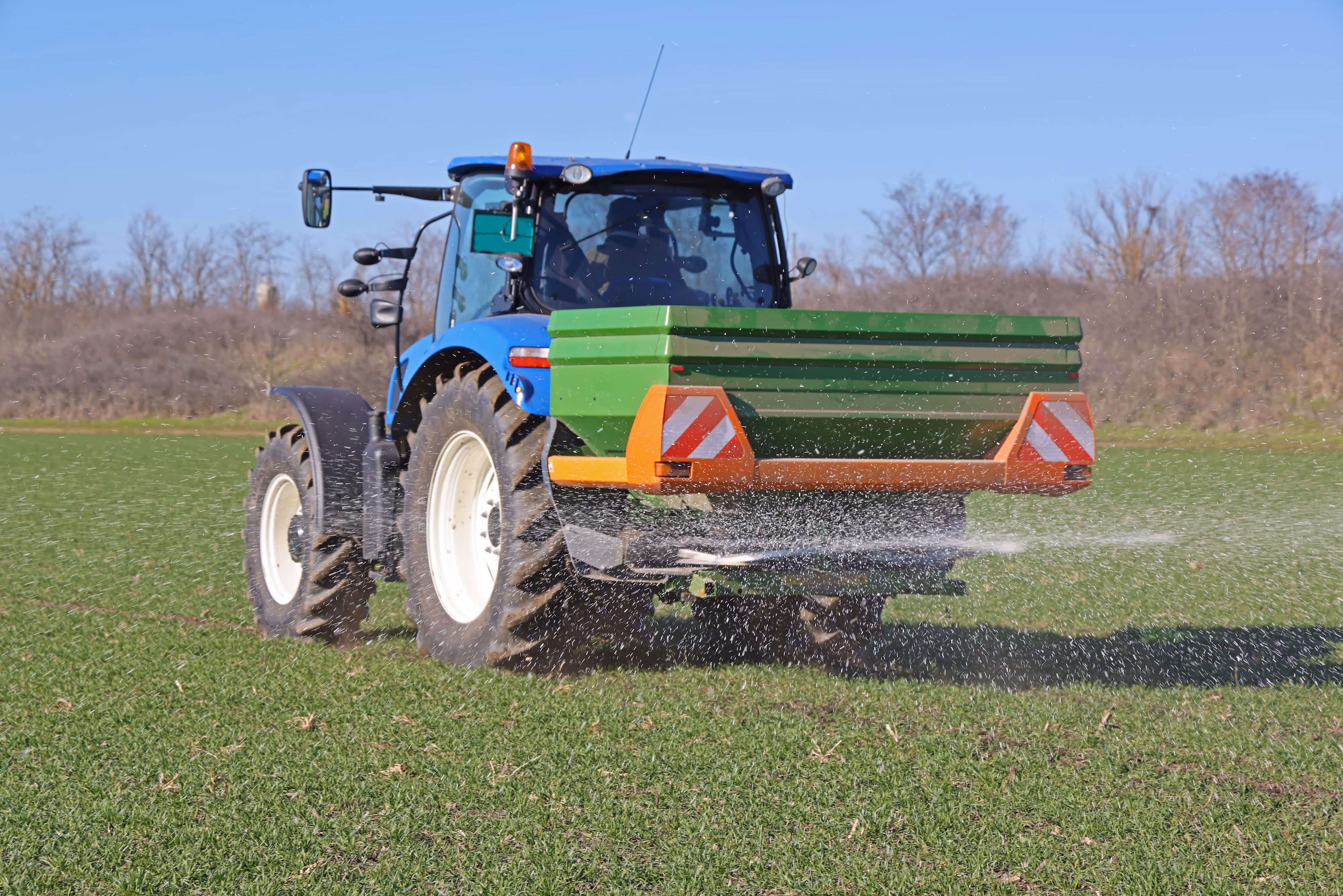 Tractor seed spreading