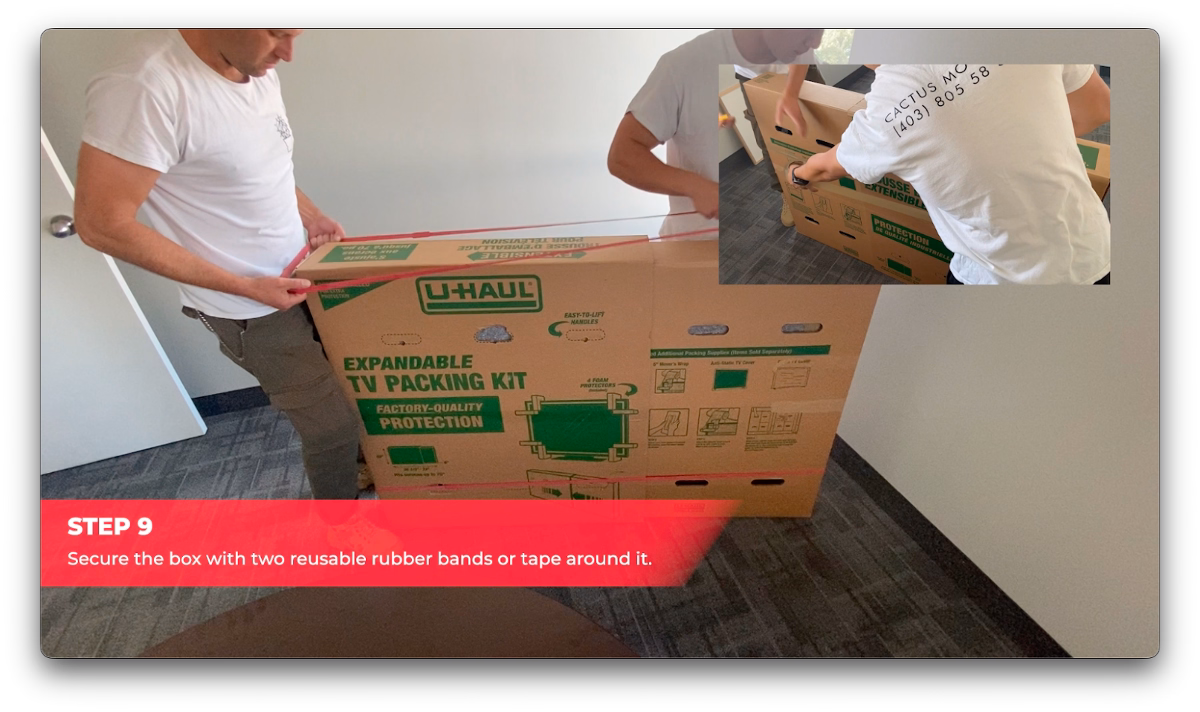 Cactus Moving workers securing a packed TV box with reusable rubber bands.