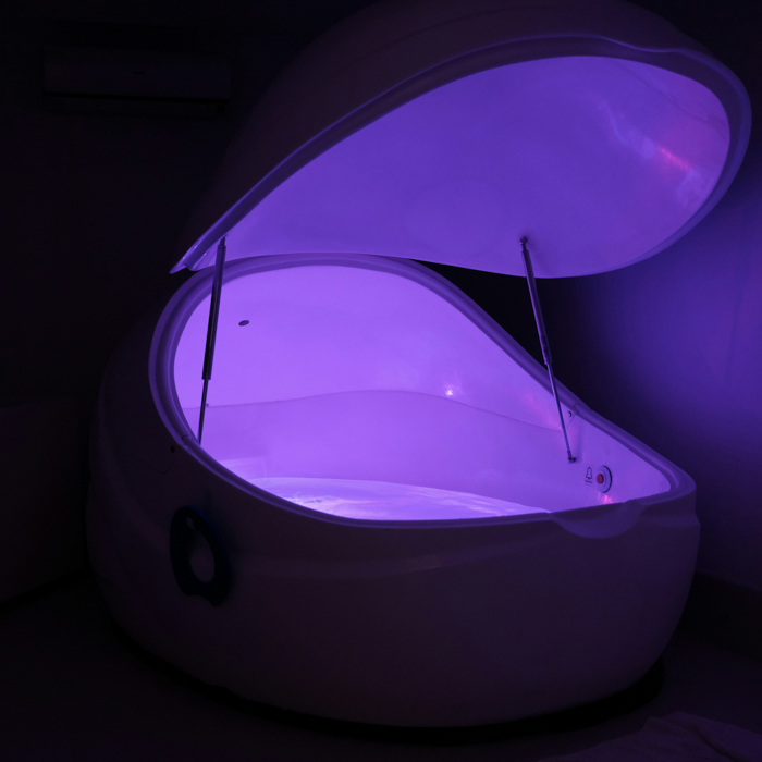 float chamber with purple lighting
