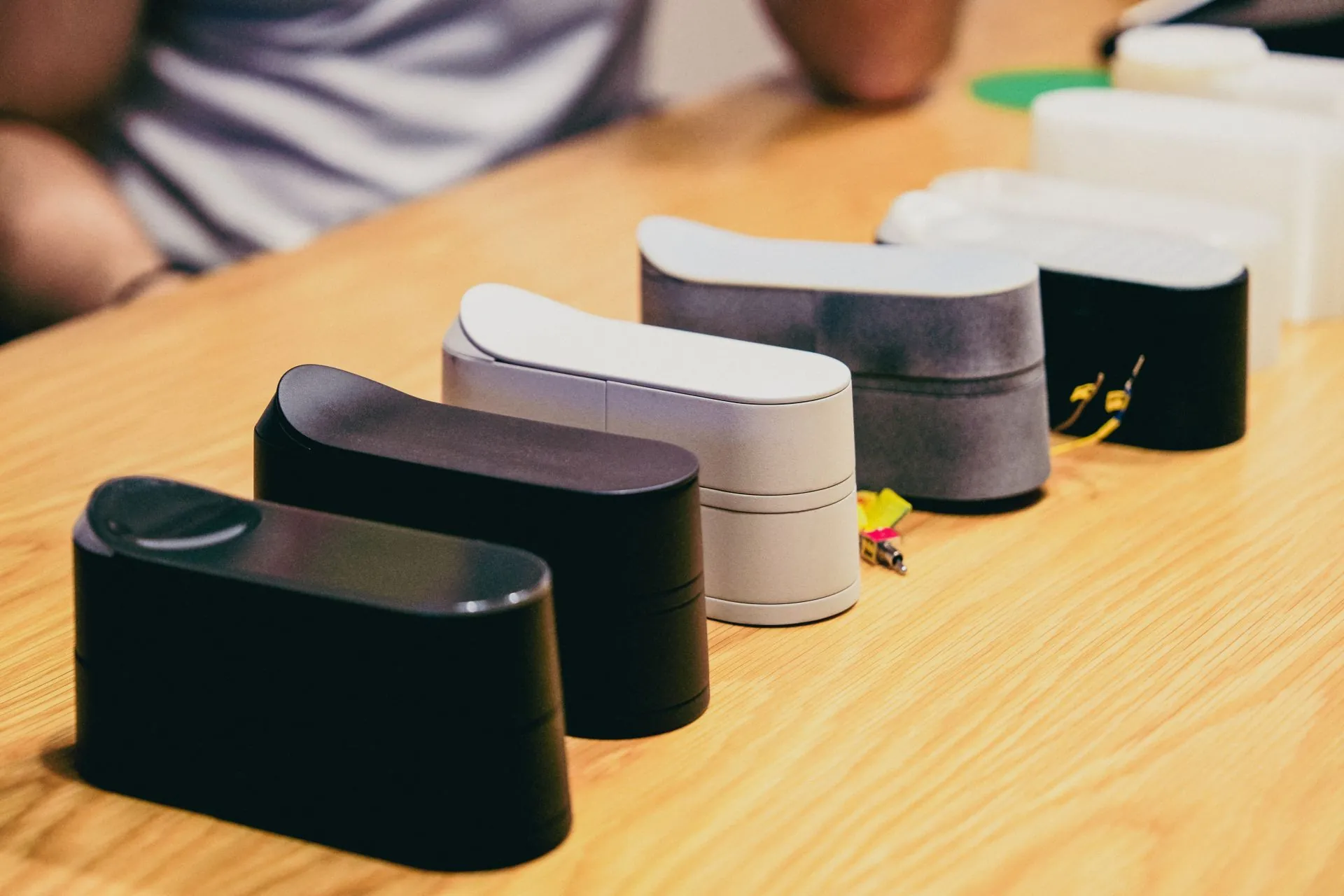 Multiple bitlock PRO prototypes layed out on a wooden table