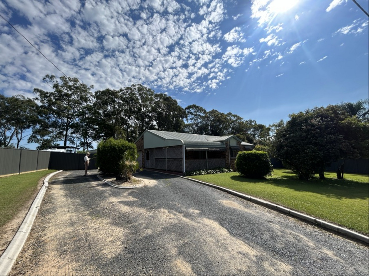 Spacious Family Home on 3,000m² with Sheds & Side Access