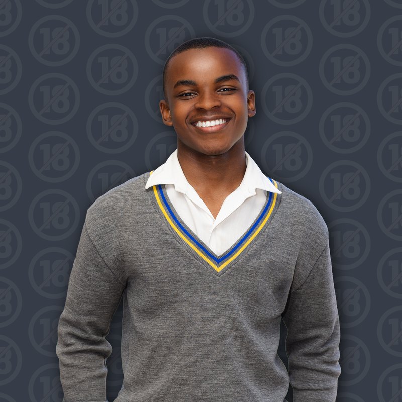 A young Maker of Tomorrow in a school jersey
