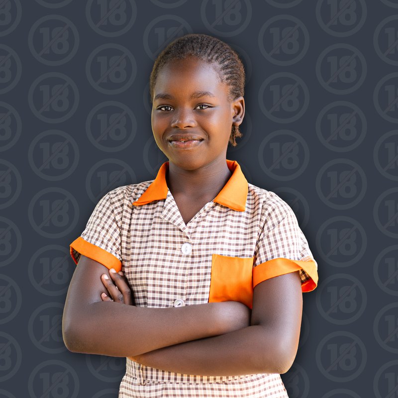 A young Maker of Tomorrow in school uniform, arms folded