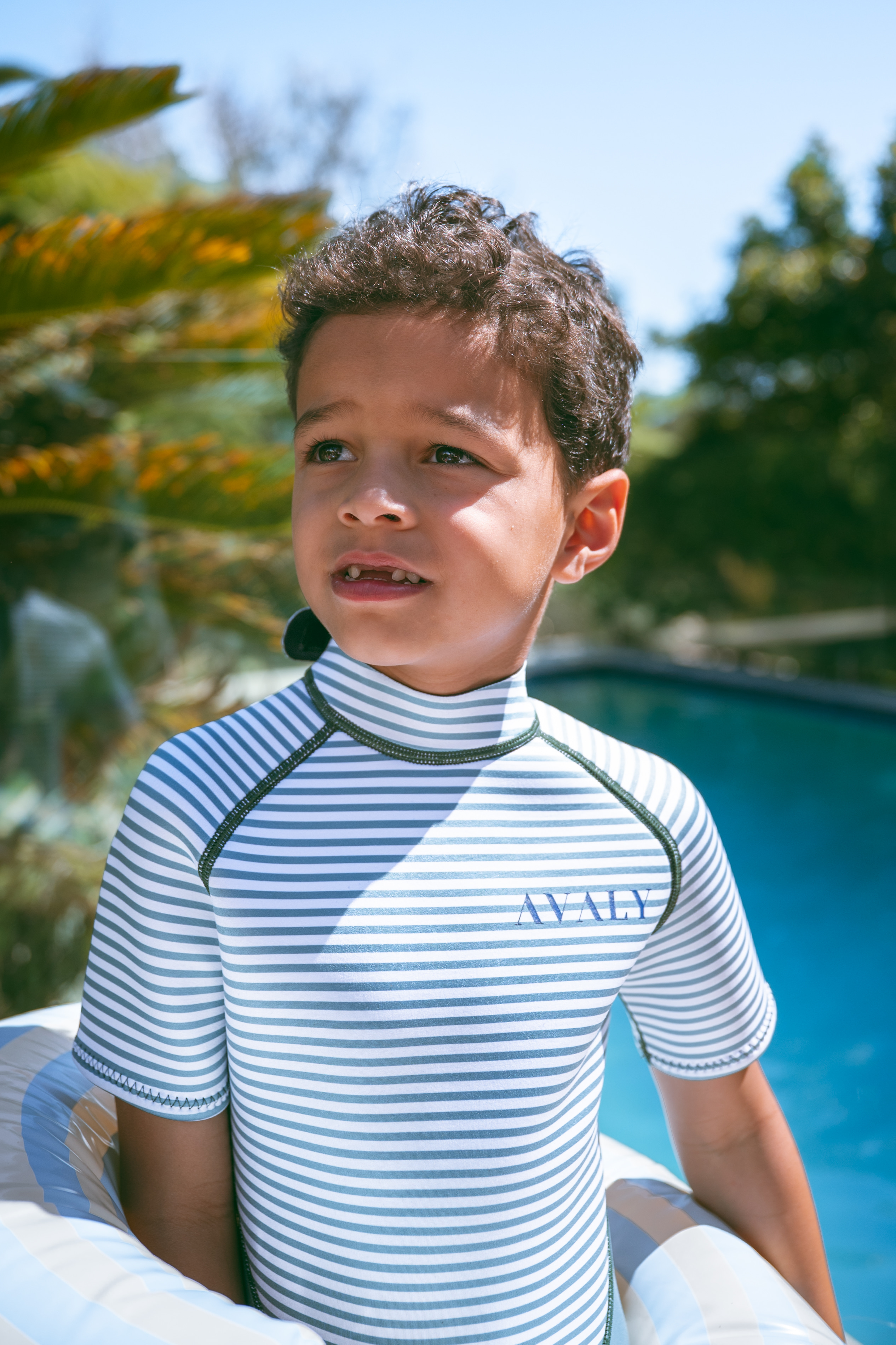 boy wearing YULEX rashguard by AVALY