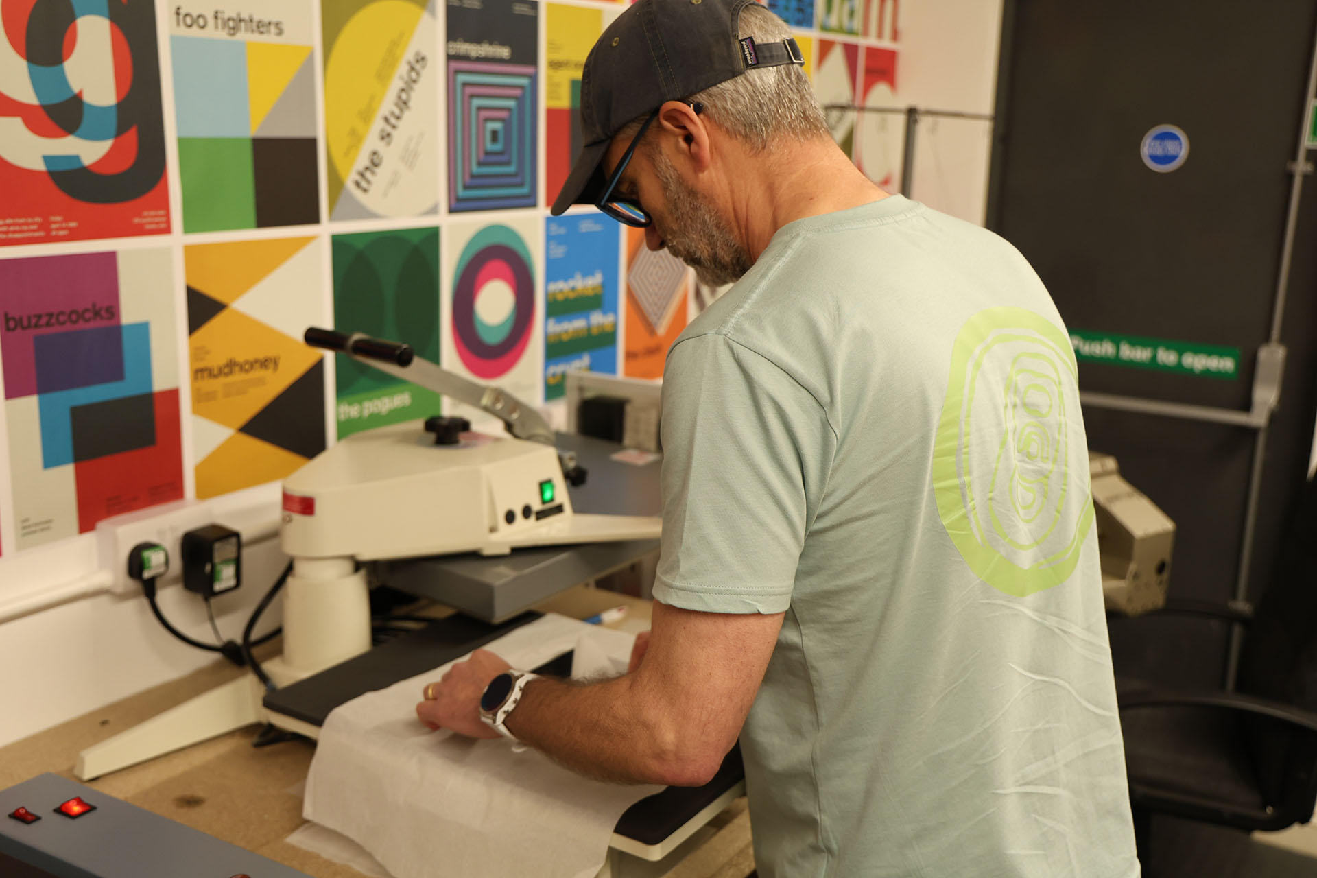 Man designing koozie