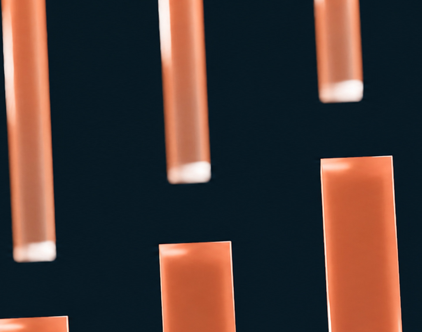 Abstract dark background with floating translucent orange rectangular bars of varying sizes.