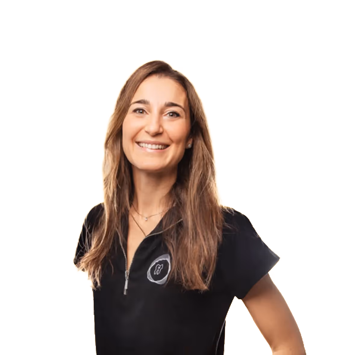 A smiling woman with long light brown hair, wearing a black T-shirt with a zipper and a tooth-shaped logo on the chest, set against a light orange background.