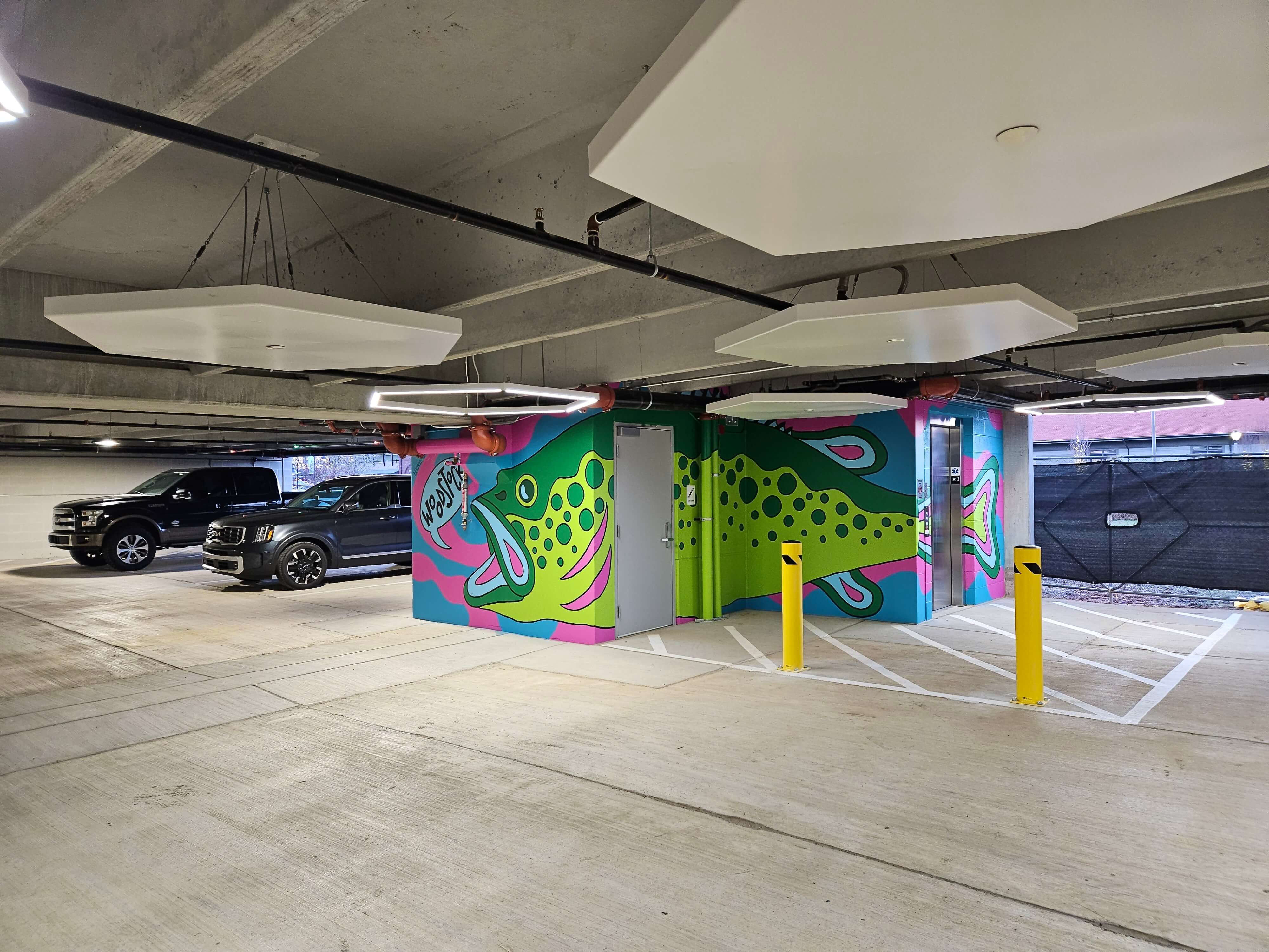 Bass mural on a parking deck by Brianna Gardocki in Woodstock, Georgia