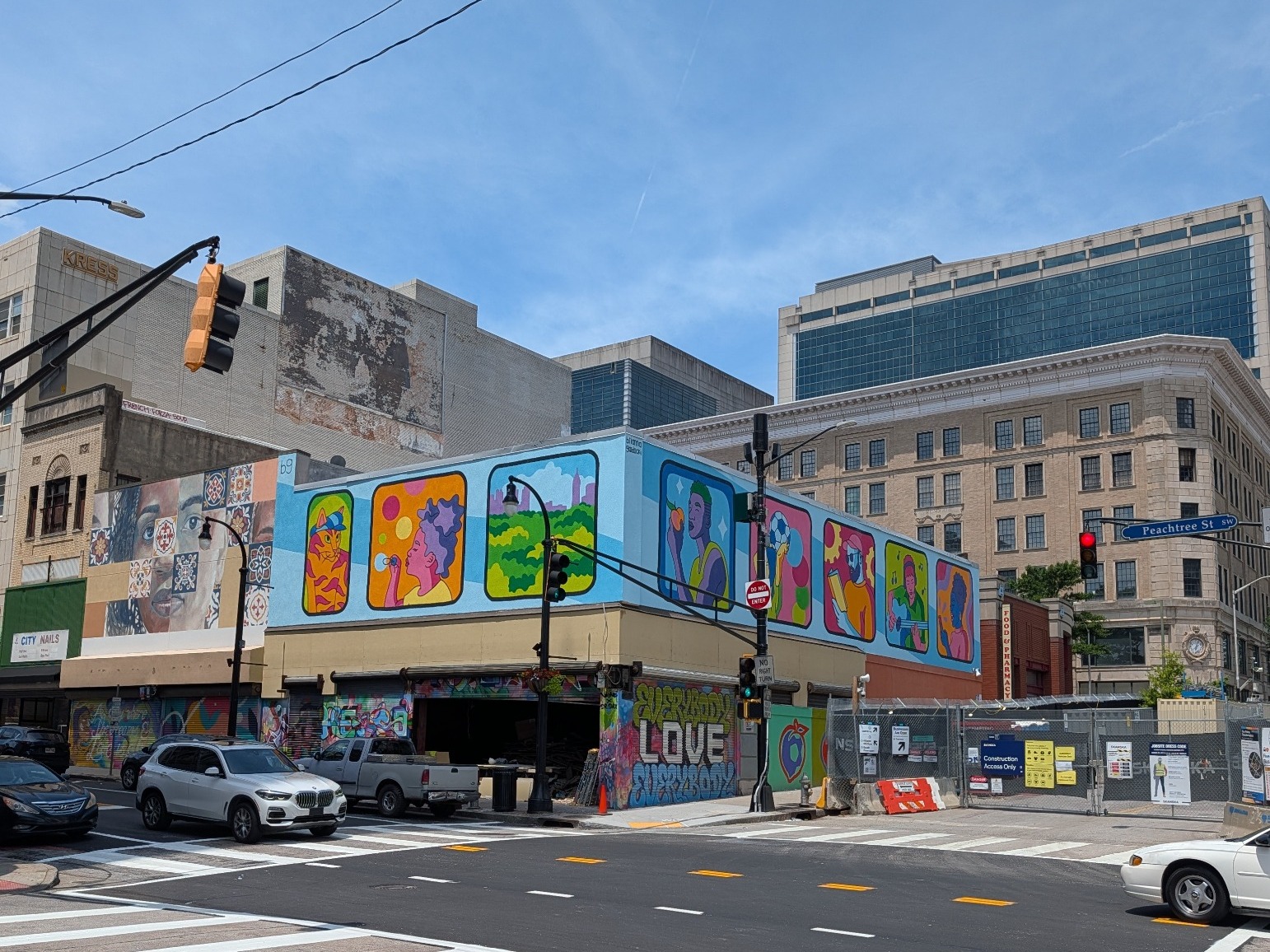 A photograph depicting artist Brianna Gardocki's mural on the Alchemy Wellness building