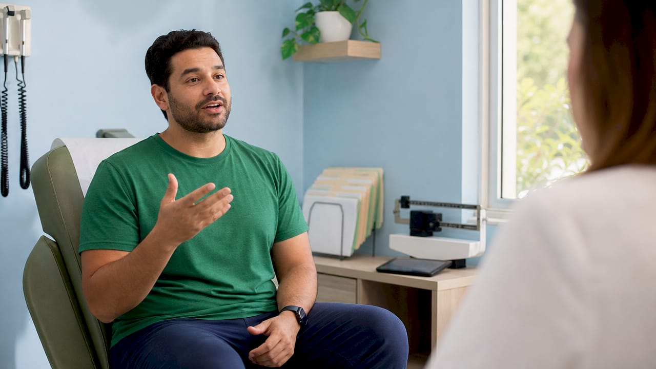 Patient discussing medical history for weight loss assessment