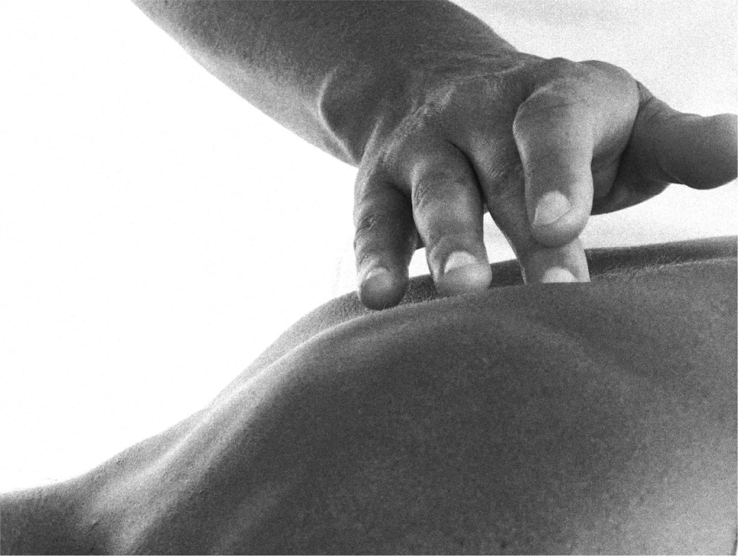 man doing acupuncture on back 