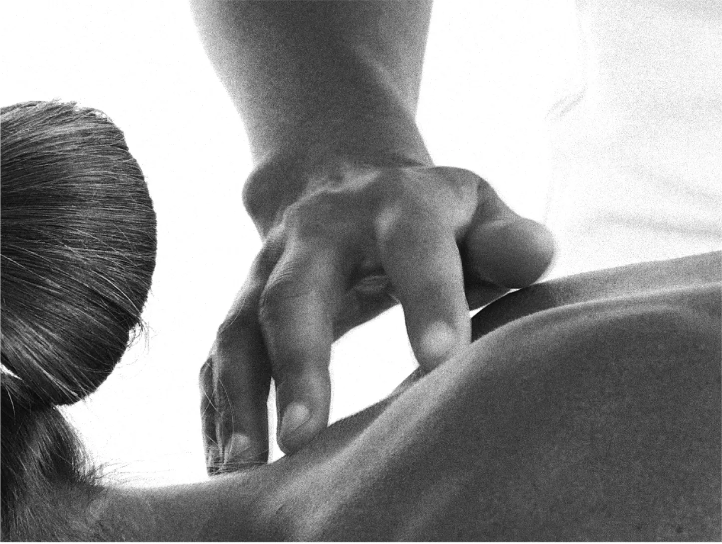 man doing acupuncture on back 