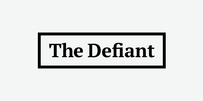 The Defiant wordmark inside a black rectangular border on a light gray background.