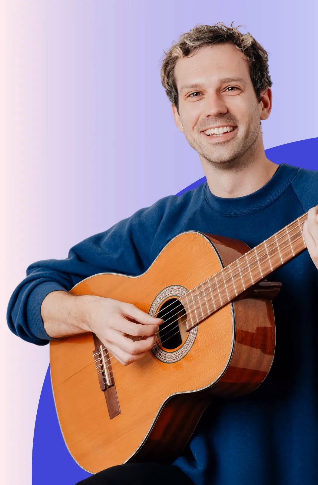 Gitarrenlehrer spielt Gitarre