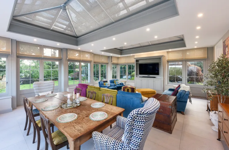 Hamptons conservatory glass structure before bespoke blinds by Grants Blinds