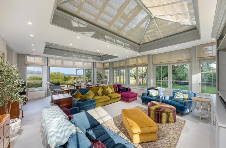 Hamptons style orangery windows before custom made blinds by Grants Blinds