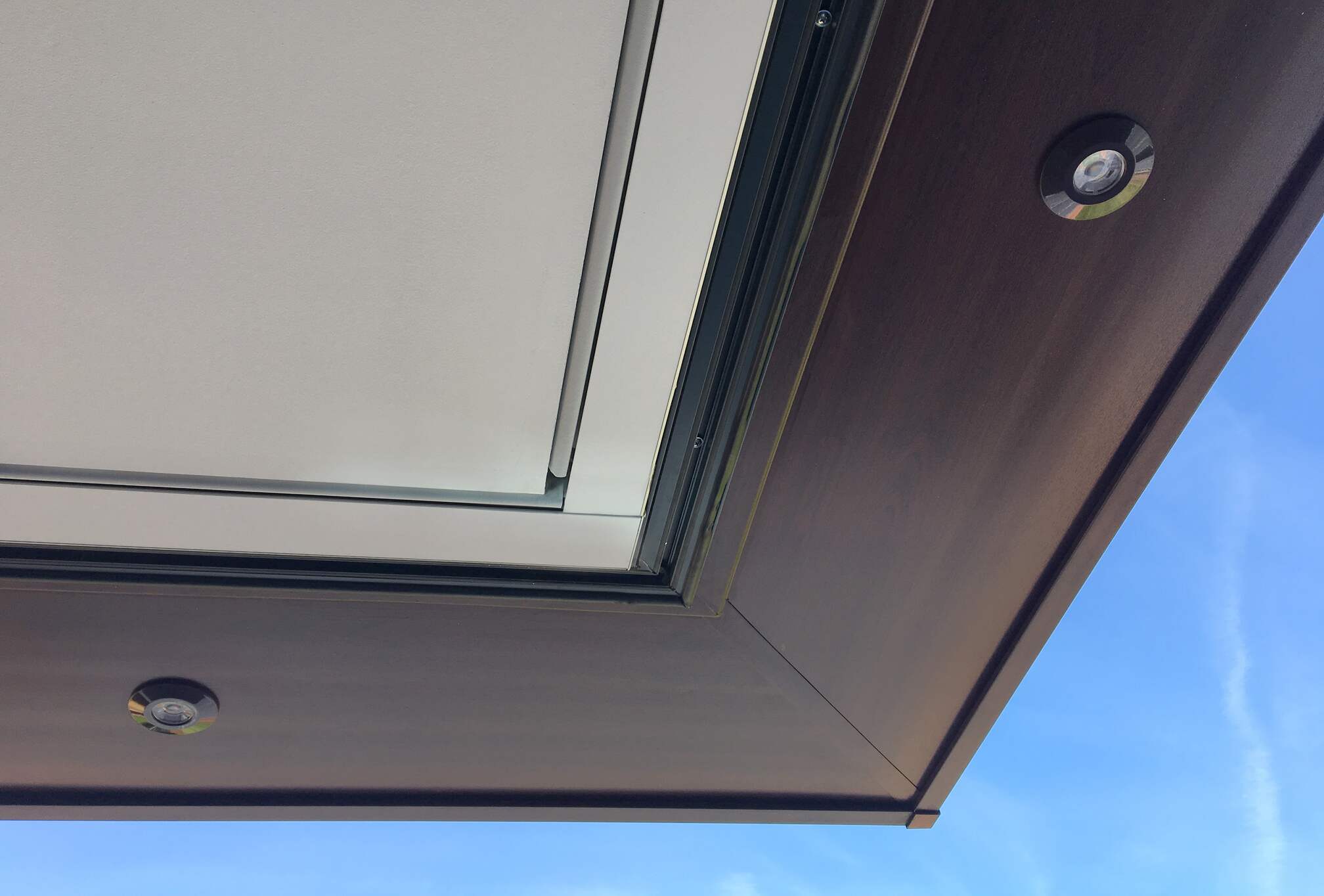 Modern interior without window treatments by Grants Blinds