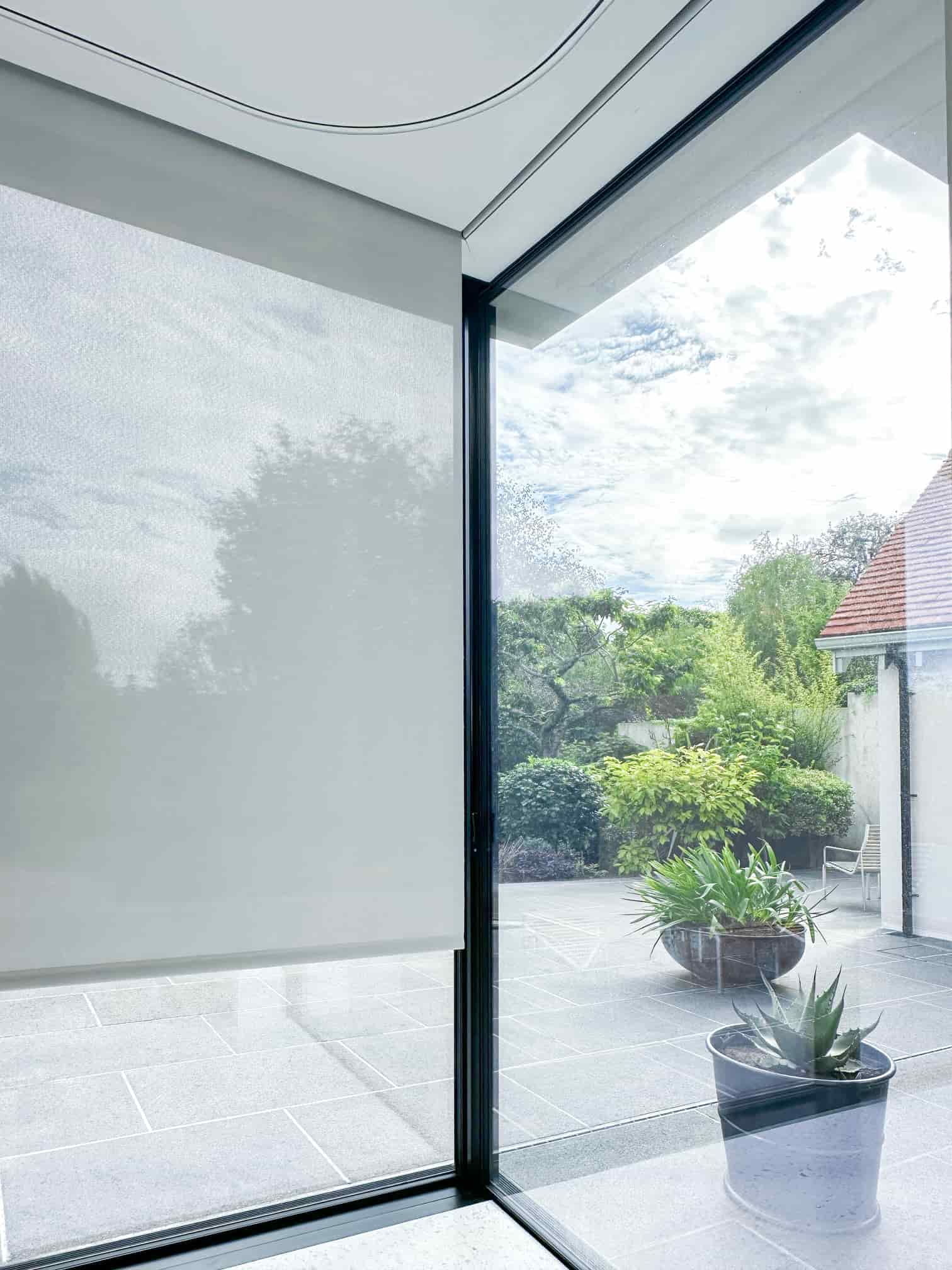 Modern interior with custom window treatments installed by Grants Blinds