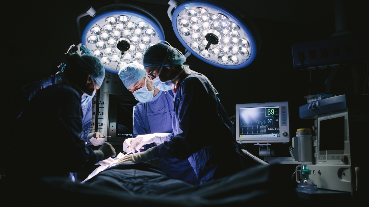 A picture of surgeons performing surgery.