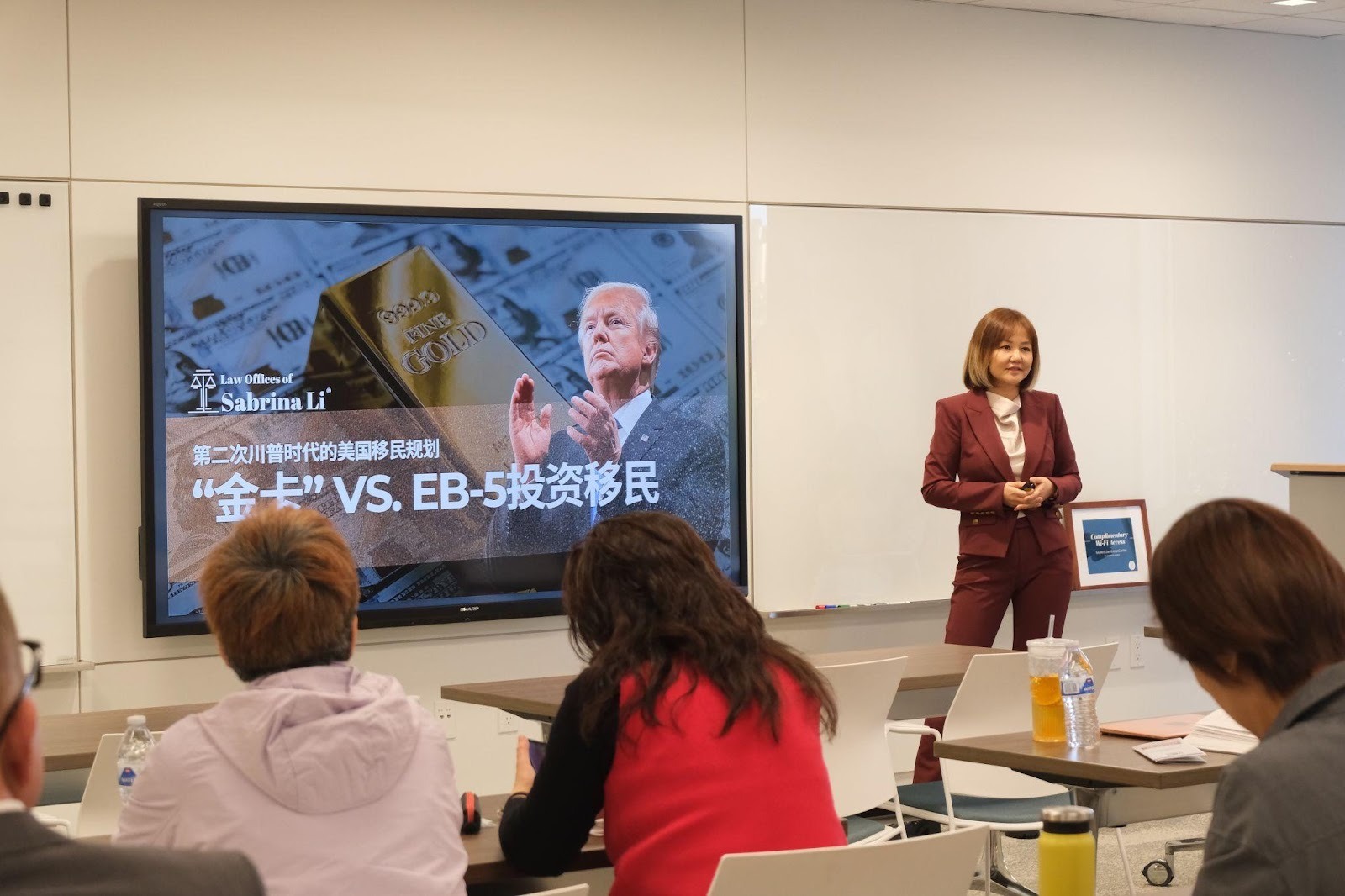 A person standing in front of a large screenAI-generated content may be incorrect.