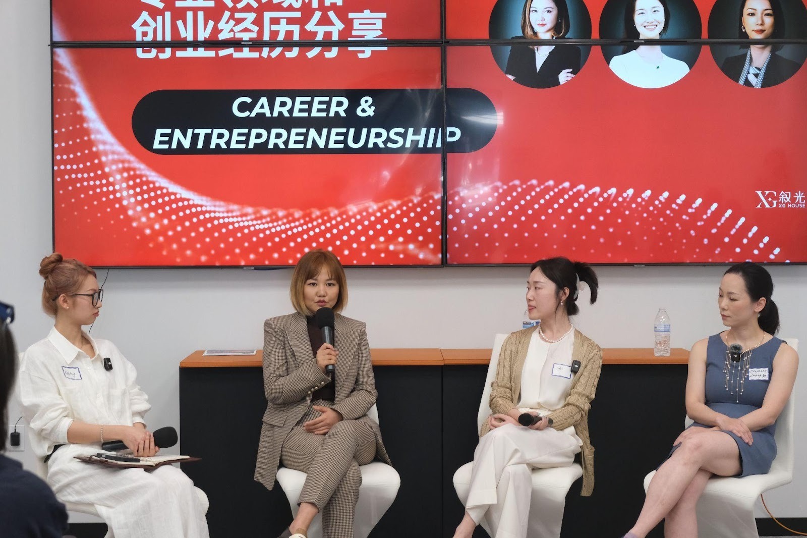 A group of women sitting in chairsAI-generated content may be incorrect.