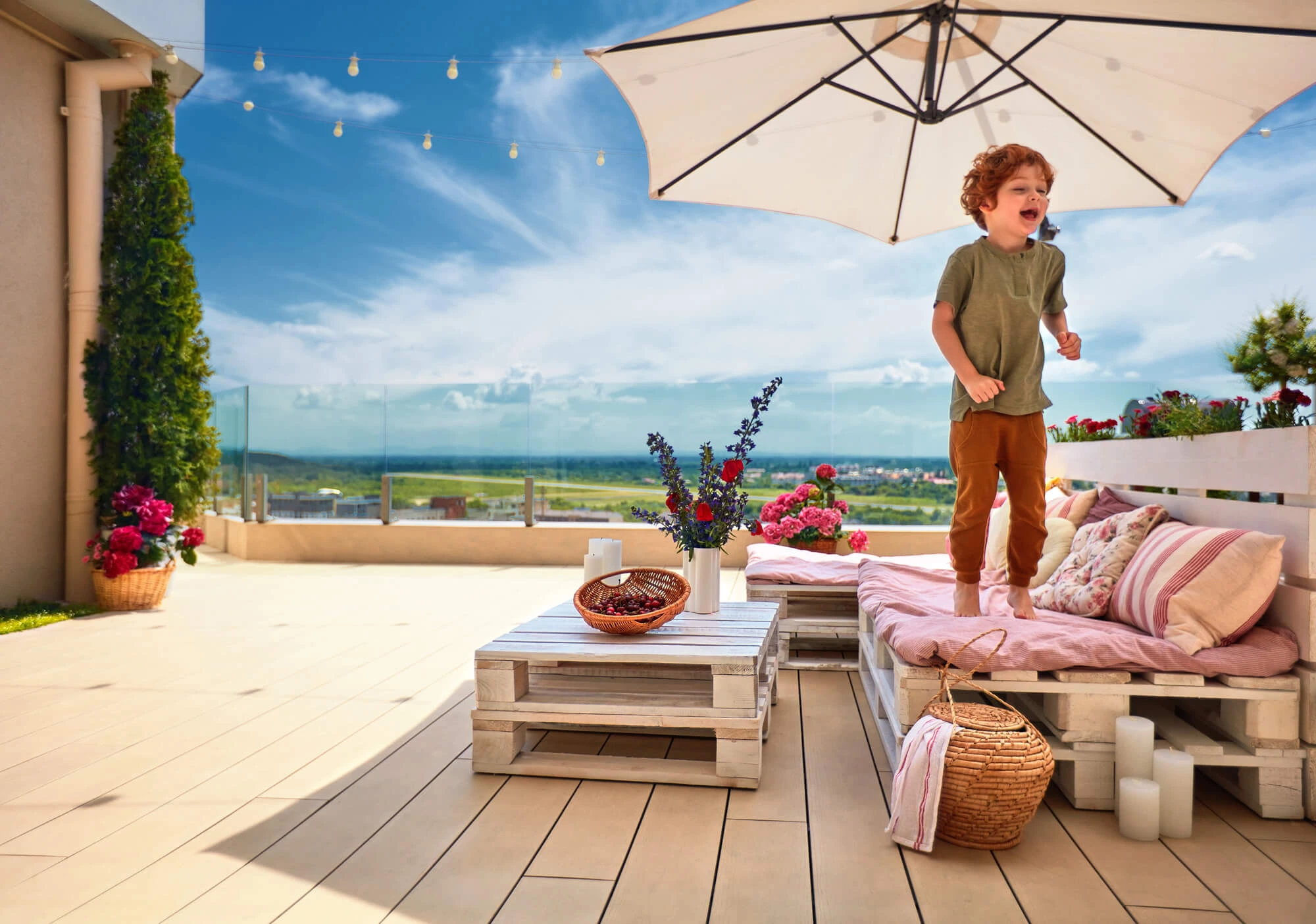 kid in in patio with furniture fromoutdoor furniture showroom palm beach
