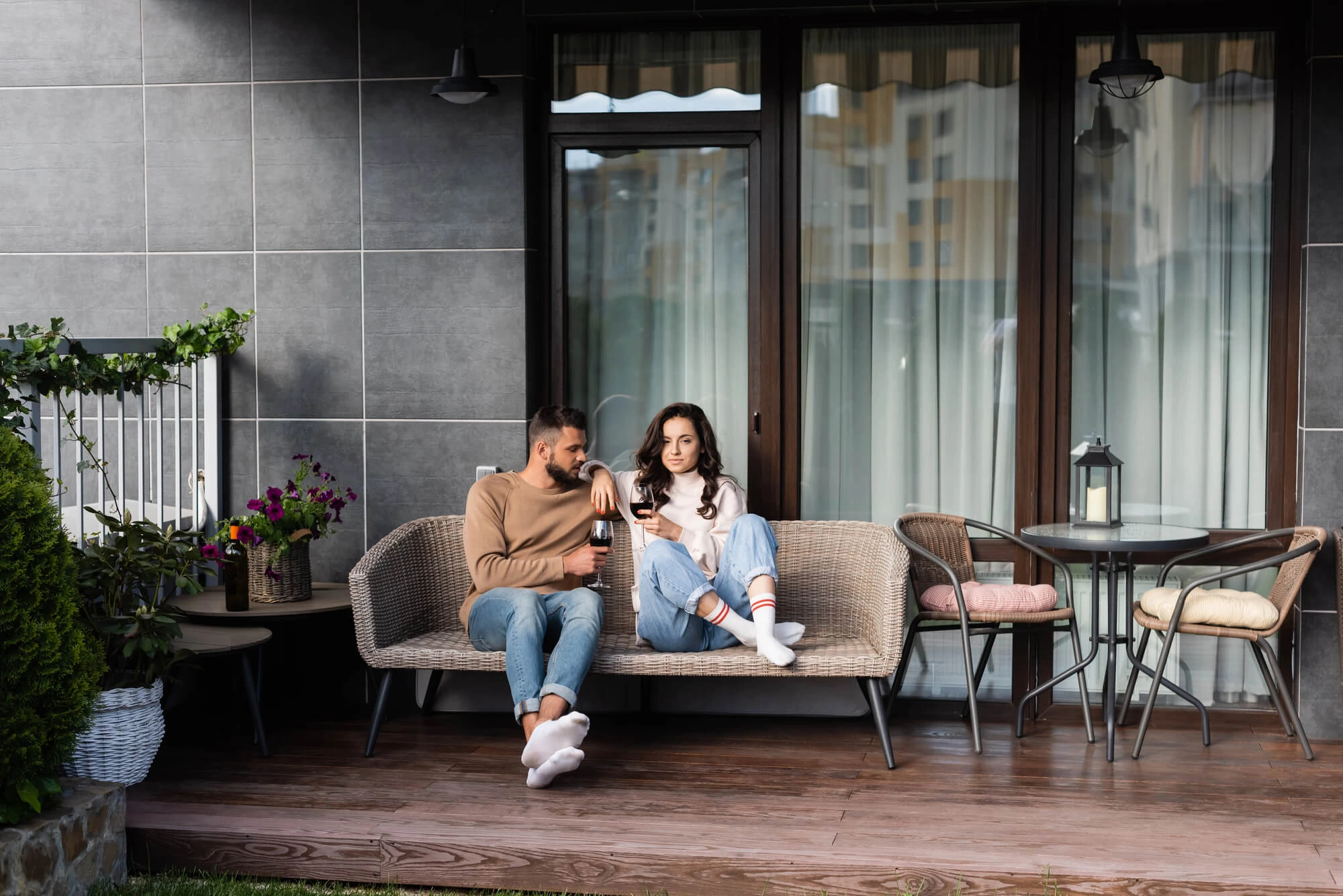 couple enjoying their outdoor living furniture boca