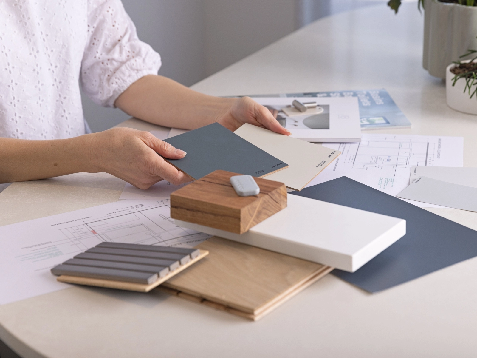 Interior designer looking at selections and finishes