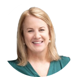 Smiling woman with blonde hair wearing a teal blouse against a white background.
