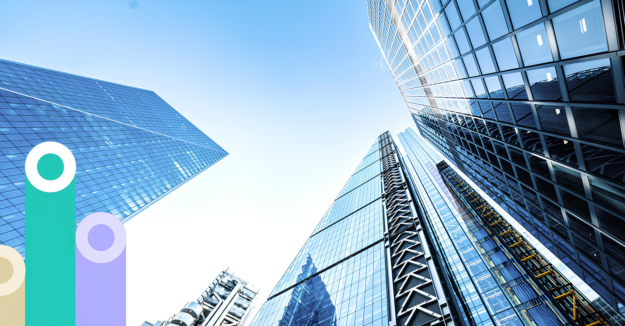 Low-angle view of modern glass skyscrapers reflecting the blue sky, with a few abstract colorful circular bar shapes at the bottom left corner.