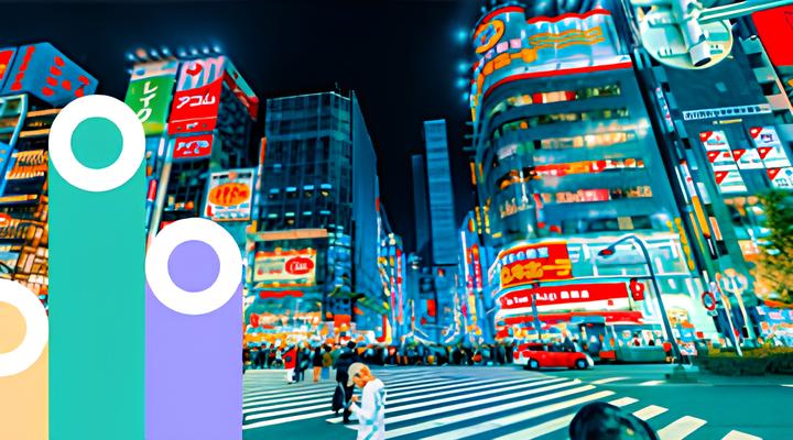 Vibrant nighttime cityscape with tall illuminated buildings and bright neon signs around a busy crosswalk filled with pedestrians.