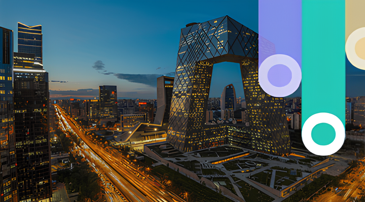 Nighttime cityscape with light trails from traffic on a busy road flanked by tall modern buildings, including the distinctively shaped CCTV headquarters in Beijing with illuminated windows and a blue sky with some clouds at dusk.