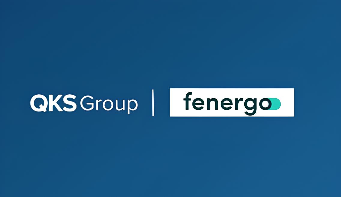 Logos of QKS Group and Fenergo side by side on a blue background, separated by a vertical line.