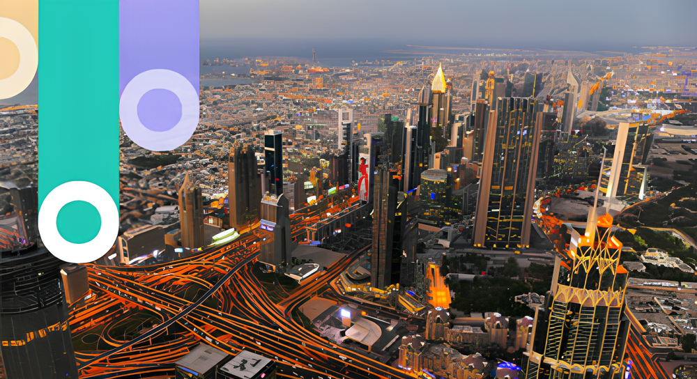 Aerial view of a modern cityscape featuring tall skyscrapers, complex multi-lane highways with bright orange highlights, and an expansive urban area extending to a coastal line under a clear sky, with colorful abstract circular elements partially overlaying the left side of the image.