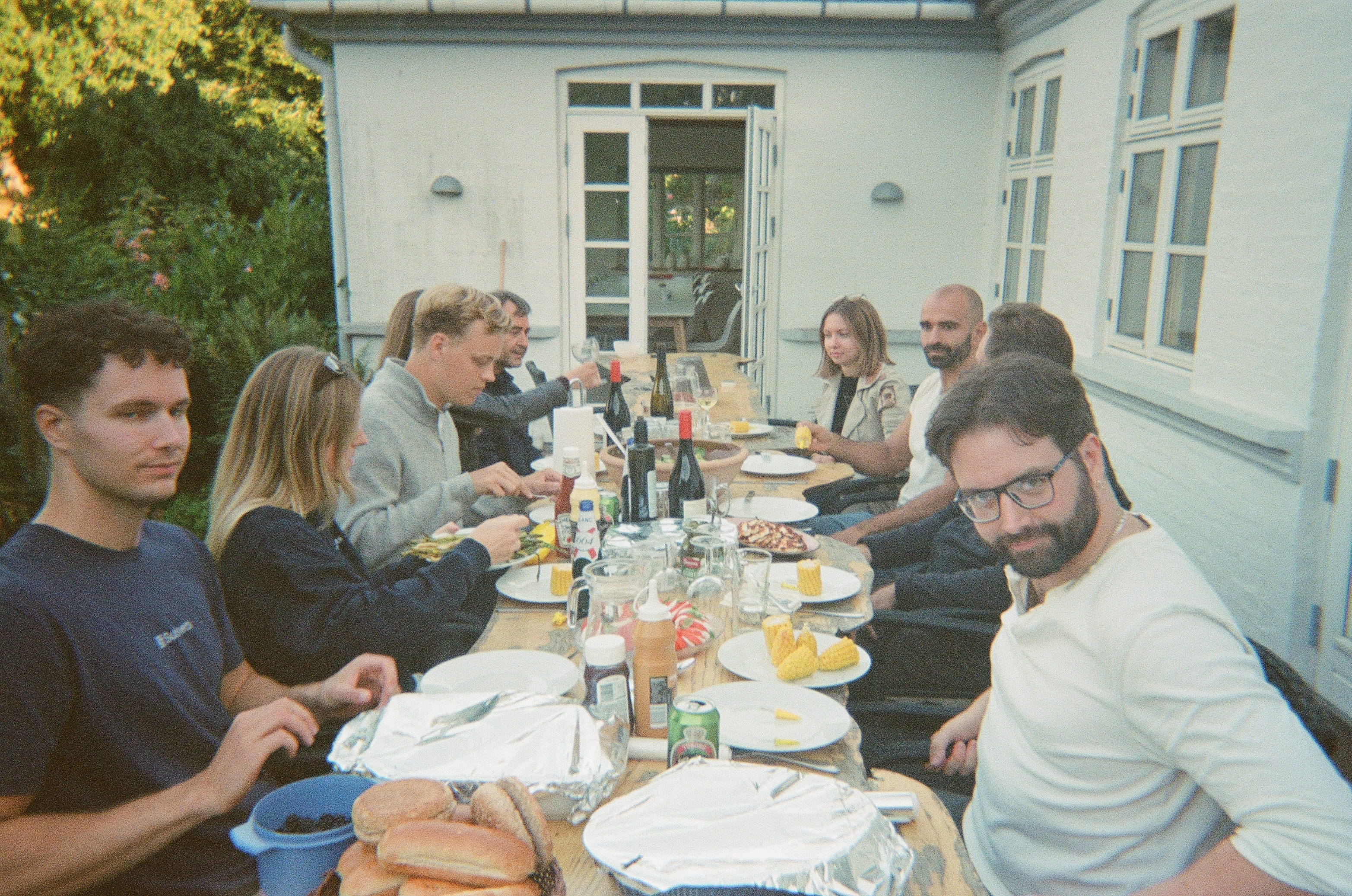 Subsets team sharing a meal outdoors