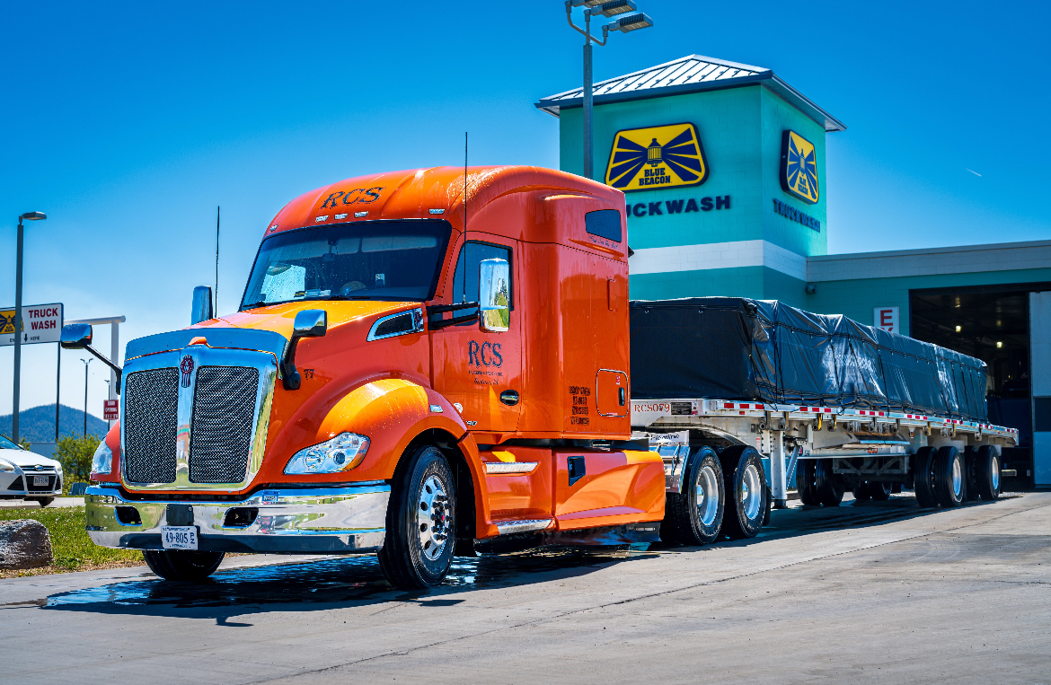 RCS Trucking flatbed and dry van trucks driving on the highway in Virginia.