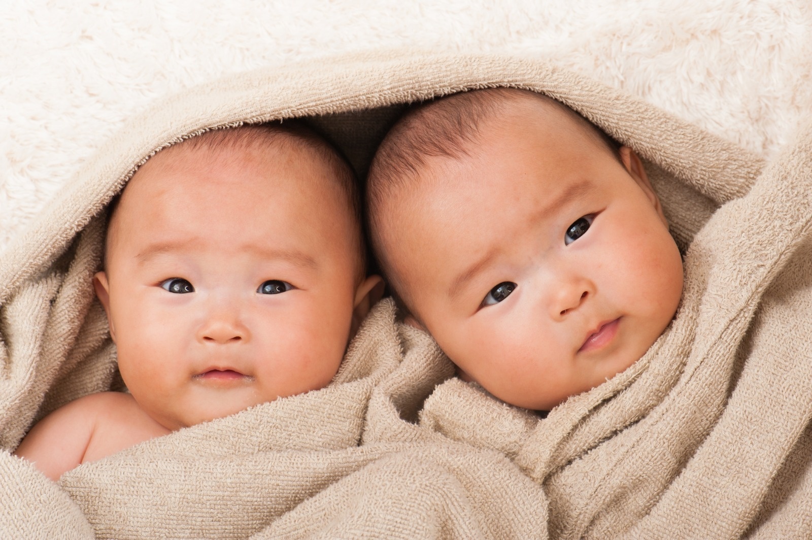 What Are the Common Health Concerns During Infancy in Twins?