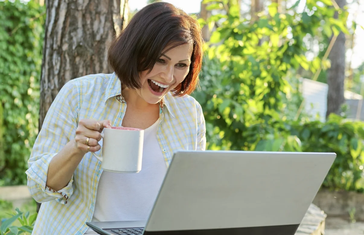 Young woman with laser corrected eyes smiling outdoors