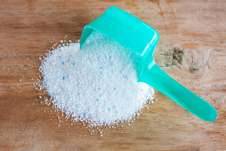 turquoise dipper with cleaning detergent