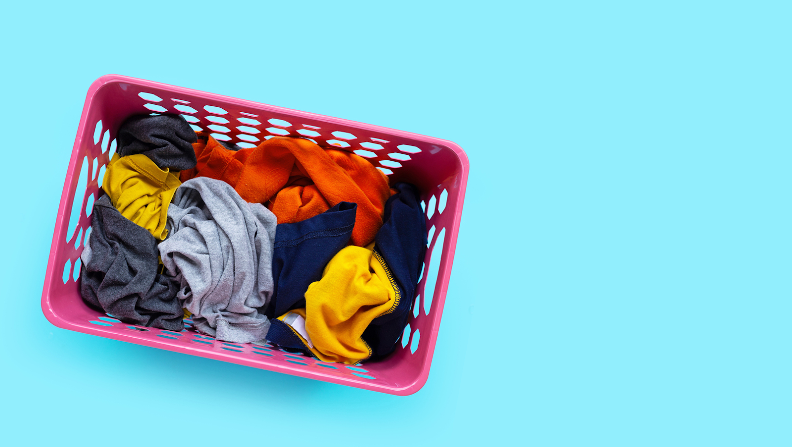 basket with dirty clothes for laundry
