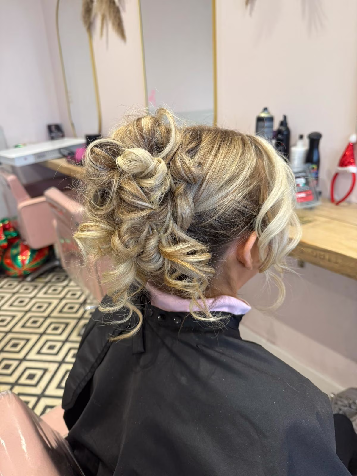Formal updo with pinned curls