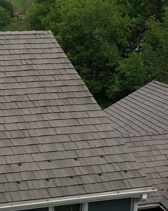 Partially visible Brava Shake Roof with Clean Lines and Completed Installation
