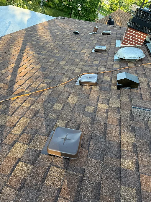 Multiple Roof Vents Installed on Freshly Shingled Roof