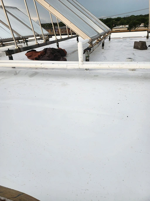 Commercial Roof in Schiller Park with New White TPO Membrane Installation in Progress