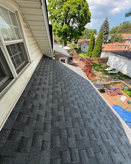 Close-up view of a newly completed shingle roof replacement in Countryside, IL
