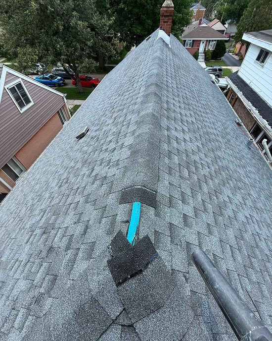 Detailed look at the ridge work during the shingle roof replacement in Countryside, IL