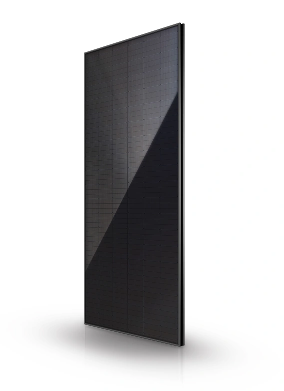 Close-up of an all-black Tesla solar panel on a white background