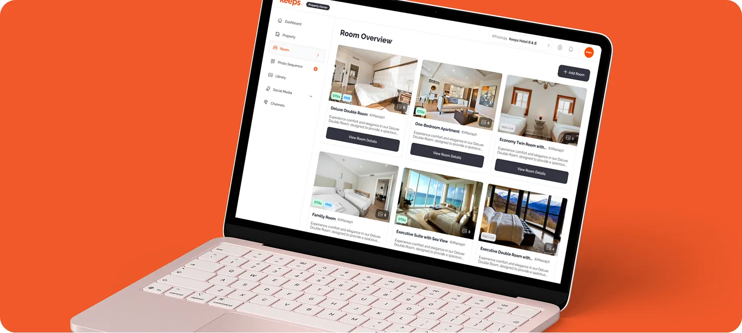 Laptop displaying a property management dashboard with room overview and photos of different room types.